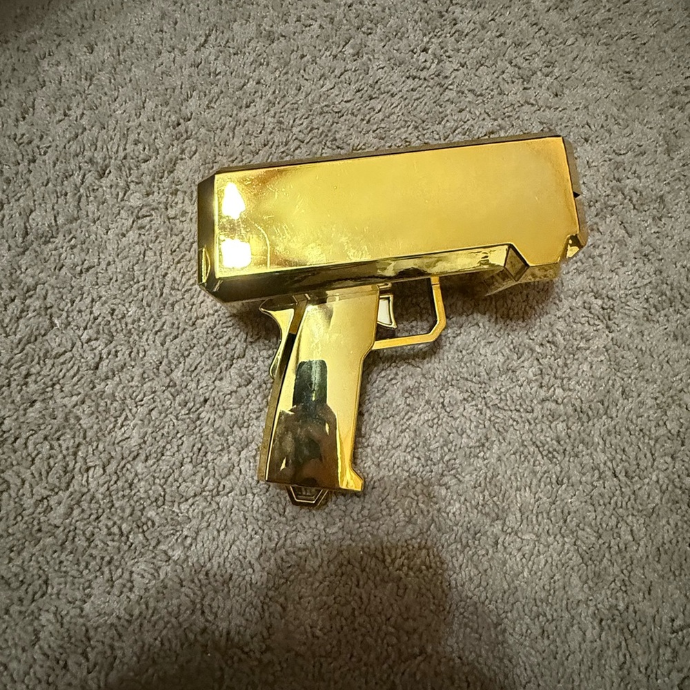 Gold Decorative Gun-Shaped Object